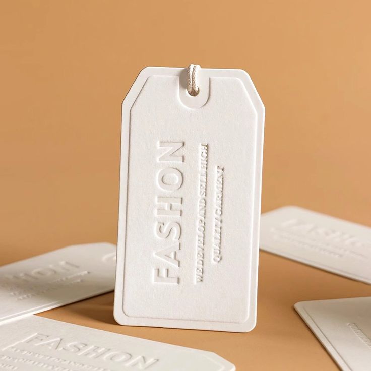 Custom Hang Tags Wholesale Supplier LansBox Printed Packaging Manufacturer in China